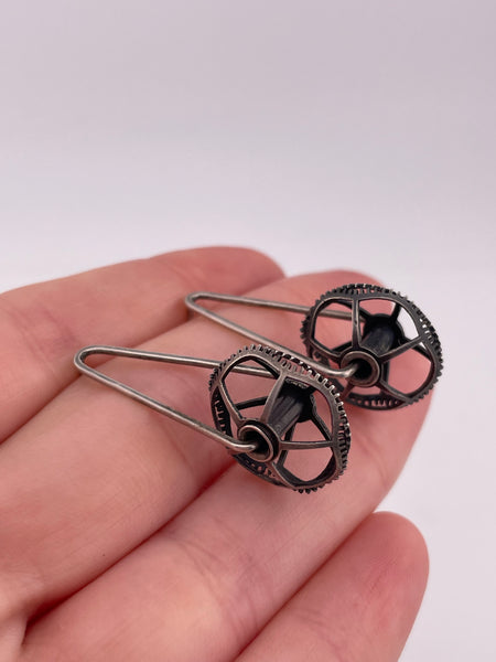 sterling silver textured spinning wheel post earrings
