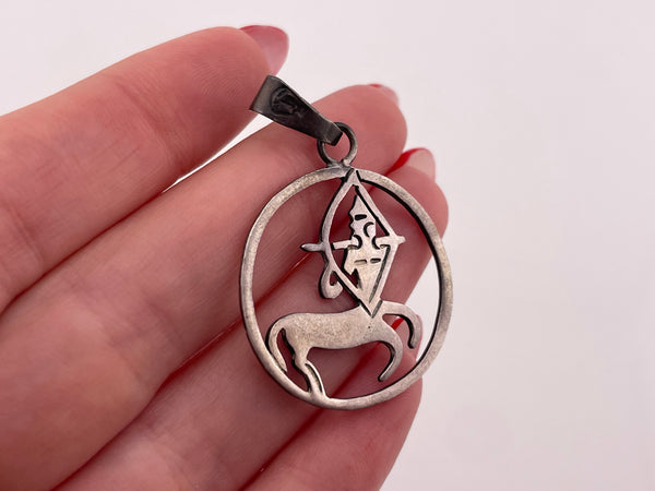 sterling silver cut-out design Sagittarius zodiac sign pendant