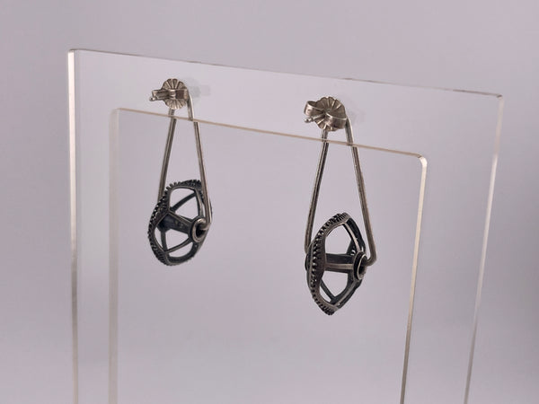 sterling silver textured spinning wheel post earrings