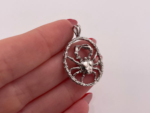 sterling silver cut-out design Cancer zodiac sign pendant