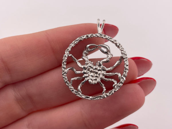 sterling silver cut-out design Cancer zodiac sign pendant