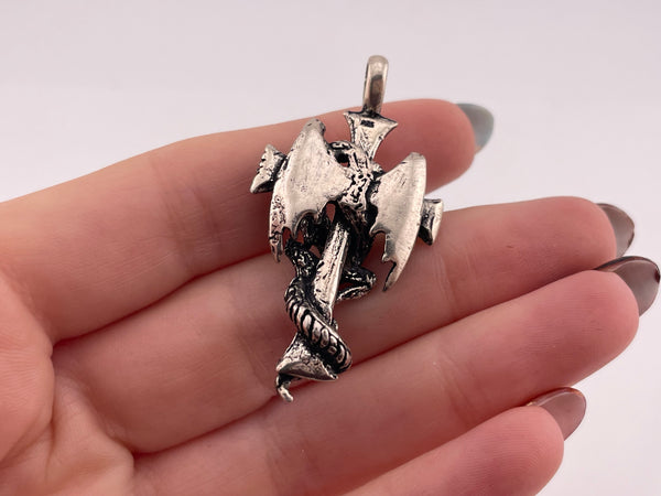 sterling silver dragon on cross pendant