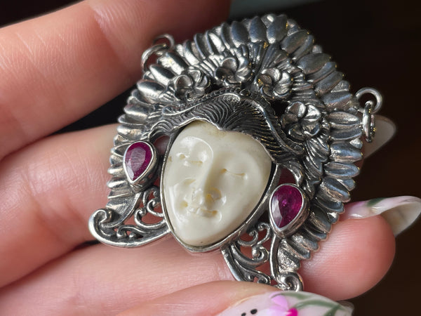 sterling silver faceted lab ruby molded plastic face pendant ***Chipped***