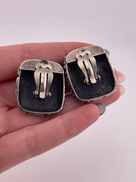 sterling silver Dian Malouf stoneless cowrie shell clip on earrings