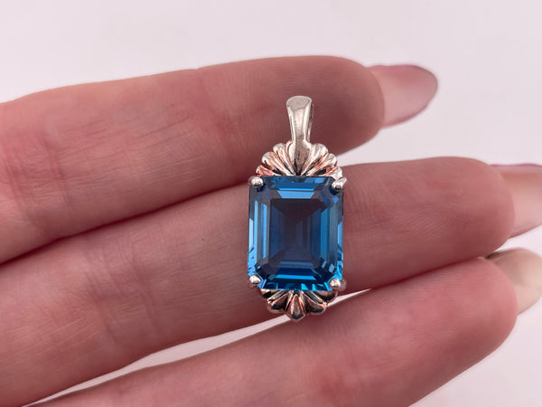 sterling silver faceted blue glass pendant
