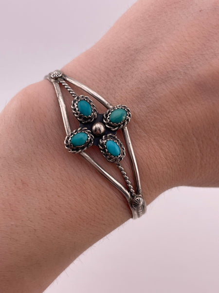 sterling silver 6-3/8" four stone turquoise twsited design bracelet