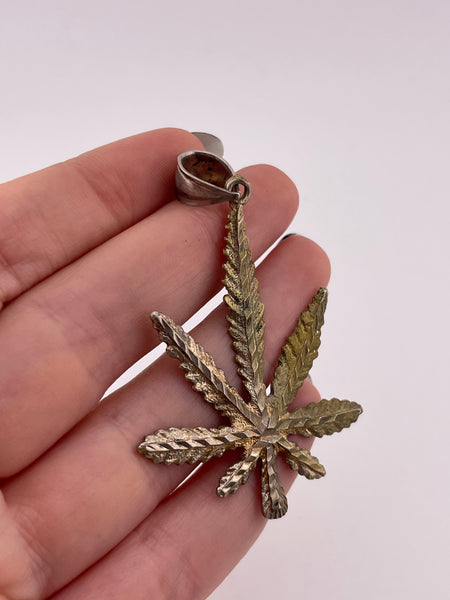 sterling silver pressed cannabis leaf pendant