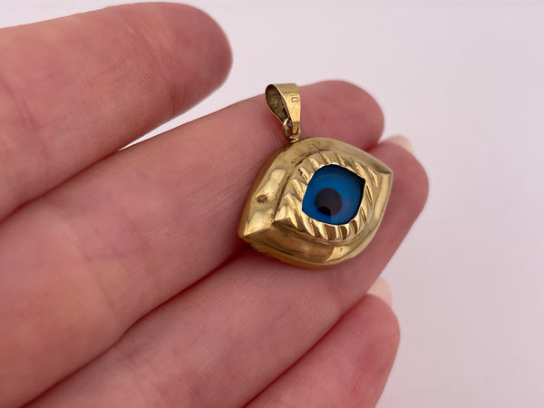 14k yellow gold blue glass eye pendant *dents*