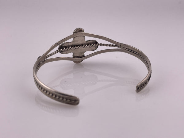 sterling silver 6-3/8" four stone turquoise twsited design bracelet
