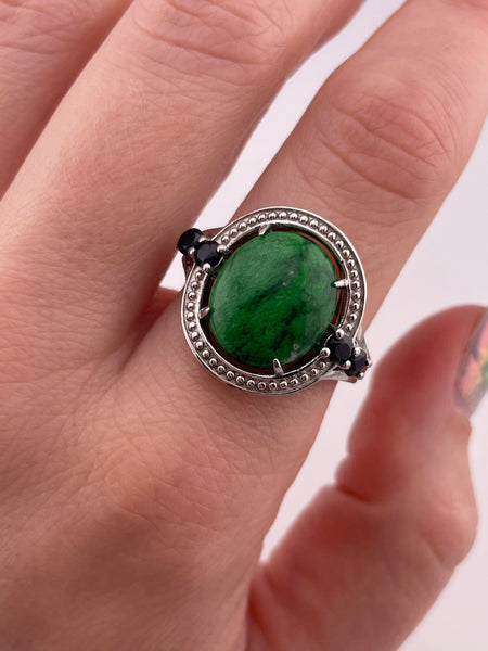 size 9.25 sterling silver rhodium plated green gemstone ring