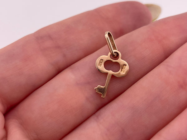 14k rosy yellow gold key pendant