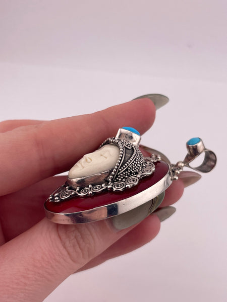 sterling silver synthetic coral turquoise molded plastic face pendant