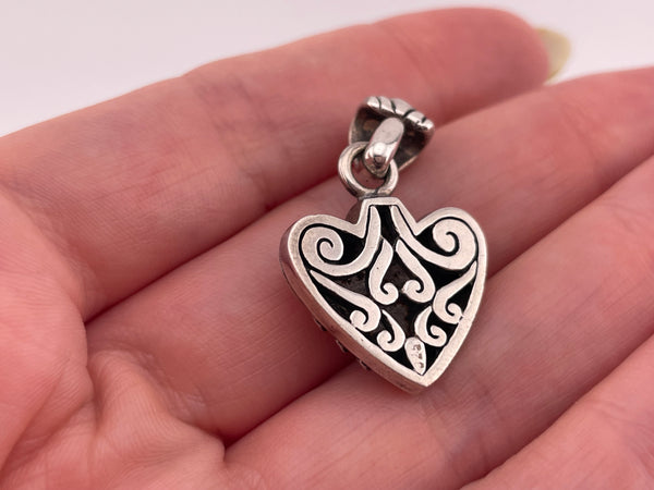 sterling silver stoneless swirl pendant