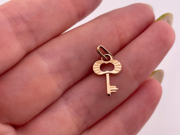 14k rosy yellow gold key pendant