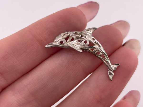 sterling silver cut-out design dolphin pendant