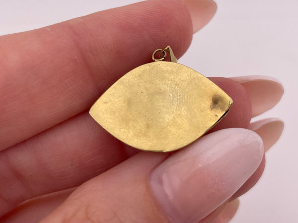14k yellow gold blue glass eye pendant *dents*