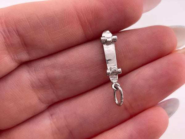 sterling silver rhodium plated skateboard charm pendant