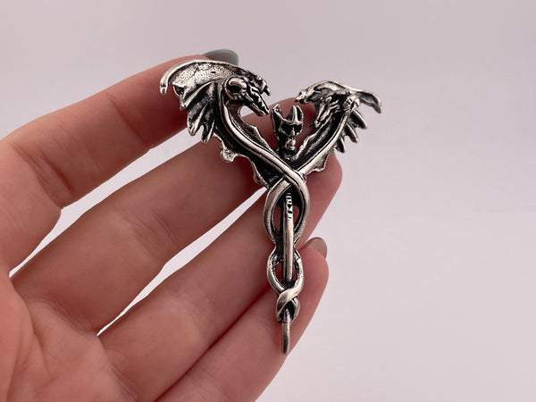 sterling silver skull sword staff serpents wings pendant