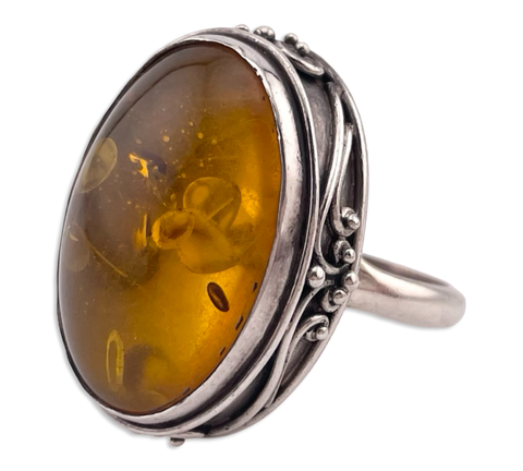 size 7.5 sterling silver scroll design oval amber ring