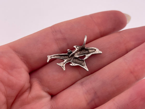 sterling silver etched double dolphin pendant