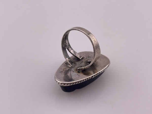 size 6.25 sterling silver rhodium plated carved black onyx face ring
