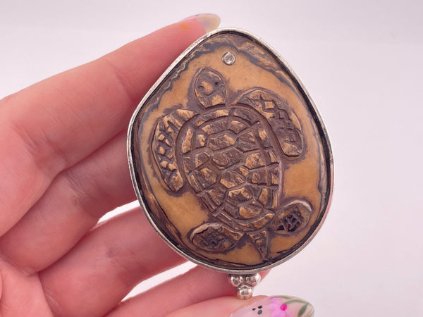 sterling silver carved material turtle pendant