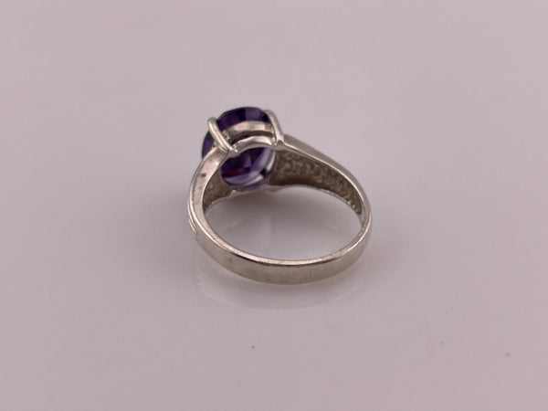 size 8 sterling silver faceted purple CZ ring