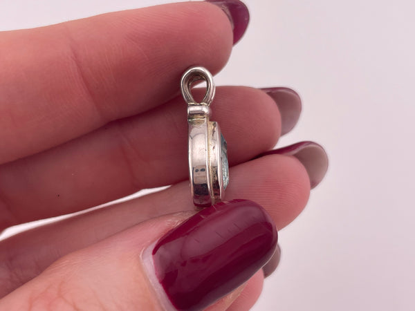 sterling silver faceted blue topaz teardrop pendant