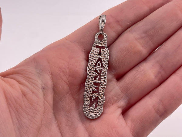 sterling silver "Taken" pendant