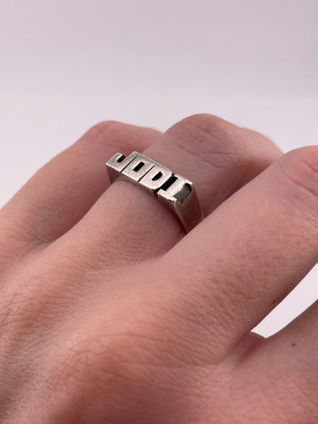 size 7 sterling silver "Jodi" name ring