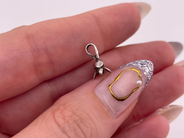 sterling silver tiny dolphin pendant