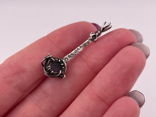 sterling silver wire wrapped glass pendant