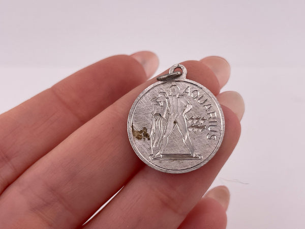 sterling silver etched Aquarius zodiac pendant