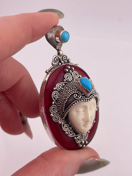 sterling silver synthetic coral turquoise molded plastic face pendant