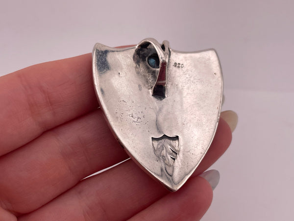 sterling silver Tribal Sons faceted blue glass shield pendant