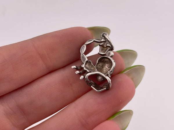 sterling silver scorpion reading book pendant