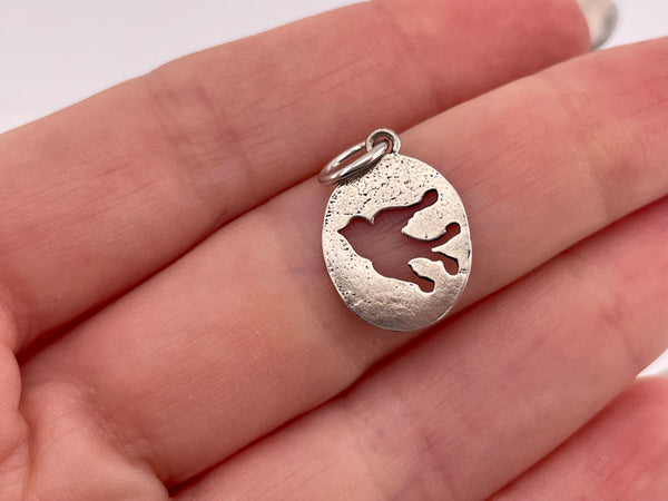 sterling silver bird cut-out design pendant