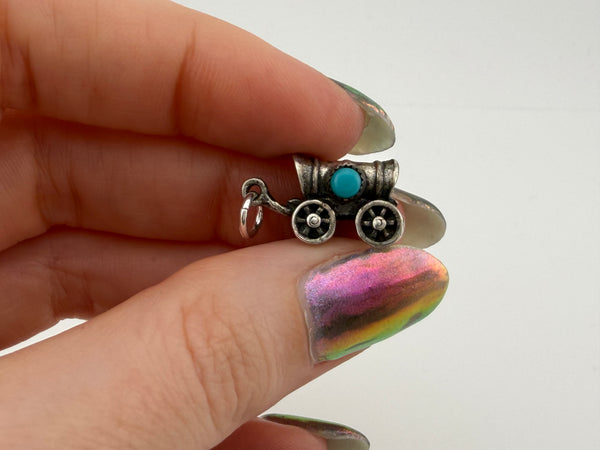 sterling silver covered wagon turquoise pendant