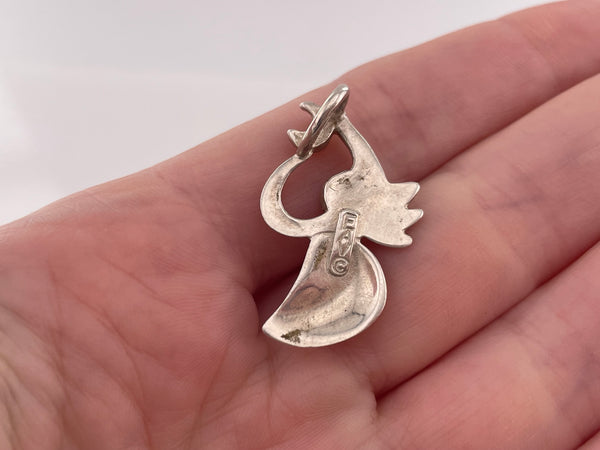 sterling silver angel holding crescent moon pendant