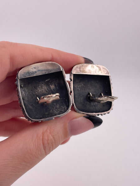 sterling silver Dian Malouf stoneless cowrie shell clip on earrings