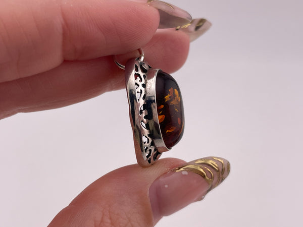 sterling silver amber oval scroll cut-out design pendant