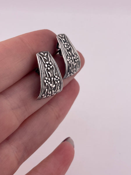 sterling silver pressed flower curved post earrings