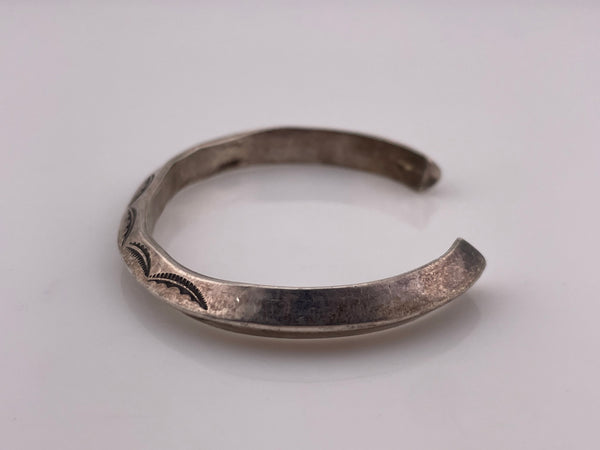 sterling silver stoneless stamped carinated cuff bracelet