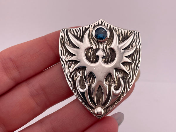 sterling silver Tribal Sons faceted blue glass shield pendant
