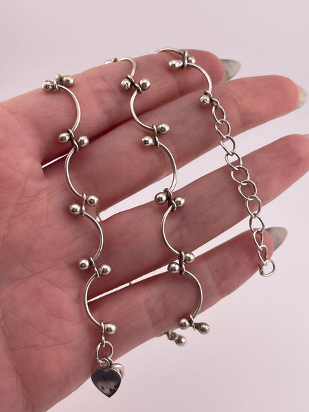 sterling silver curved ball necklace