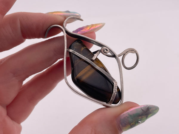 sterling silver artisan tiger's eye fish pendant
