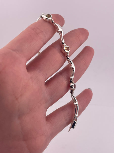 sterling silver 6-7/8" rhodium plated faceted multi-stone dolphin bracelet