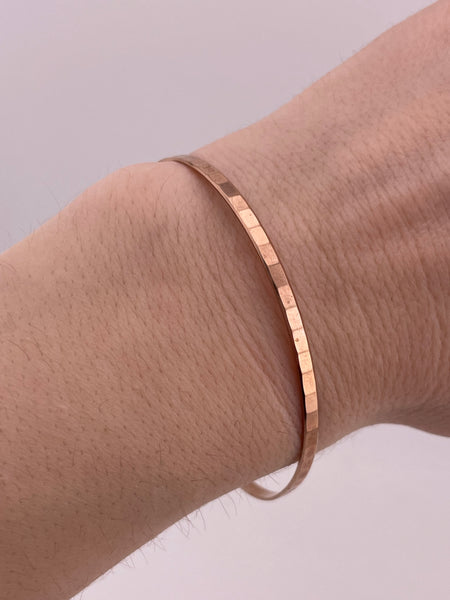 8k rosy yellow gold textured bangle bracelet