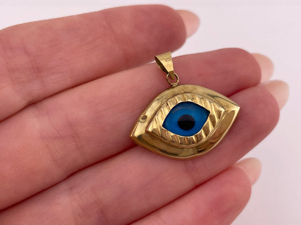 14k yellow gold blue glass eye pendant *dents*