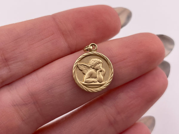 14k yellow gold round double-sided cherub angel matte finish pendant